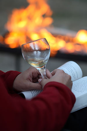 Wine by the fire on the Yellowstone Lake